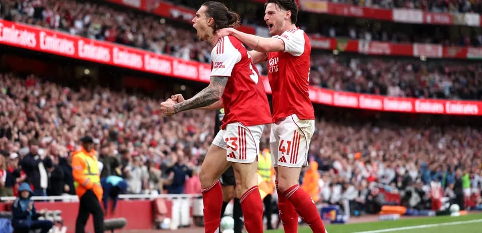 Players celebrating a goal during Arsenal match