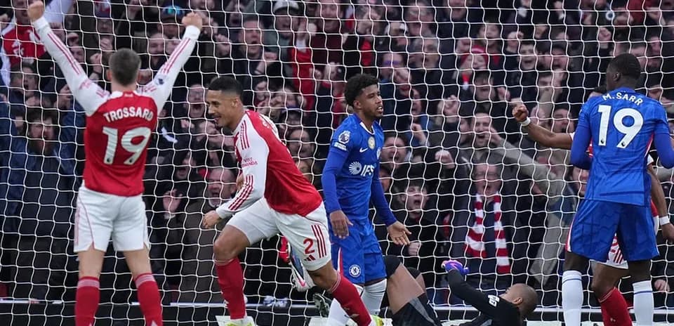 Arsenal players celebrating after scoring a goal