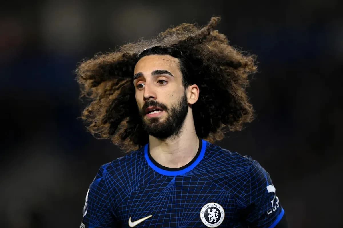 Player with curly hair in Chelsea kit