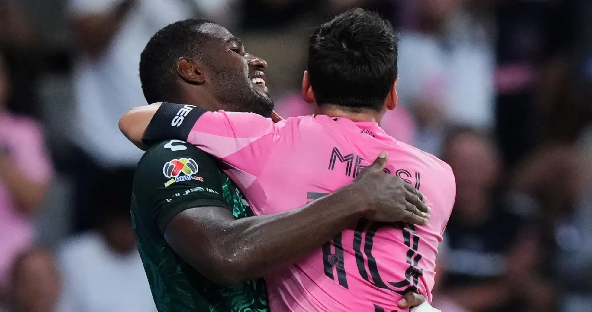 Two players embracing after a match celebration