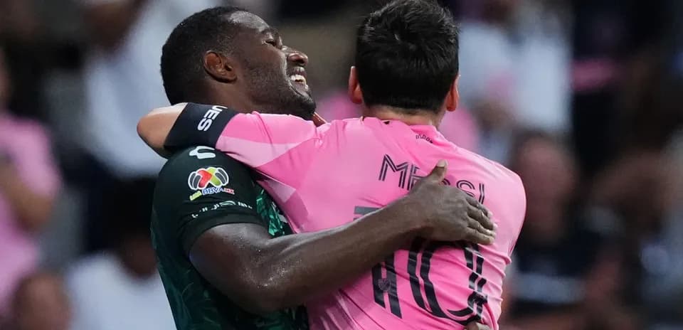 Two players embracing after a match celebration