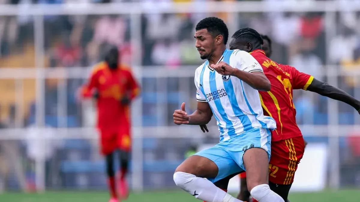Player challenging for the ball during match