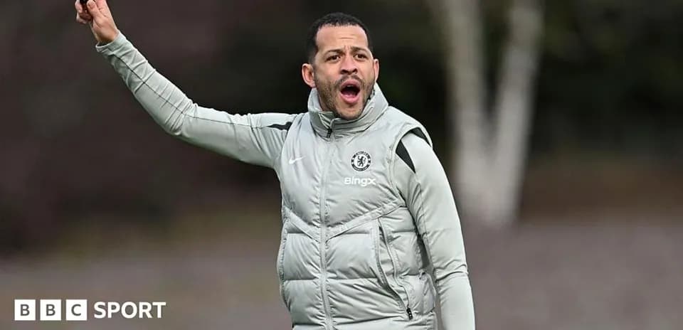 Coach giving instructions during training session