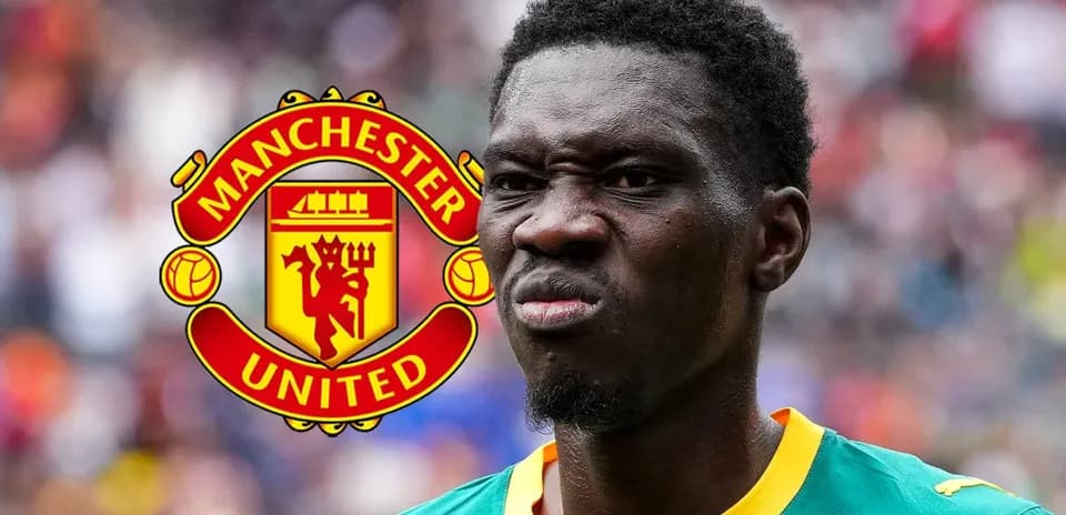 Player in green jersey with Manchester United logo background