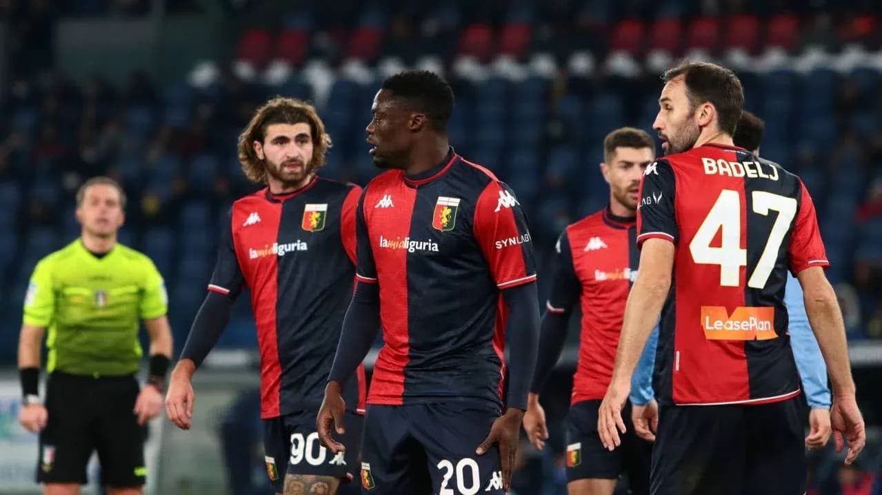 Genoa players discussing during a match