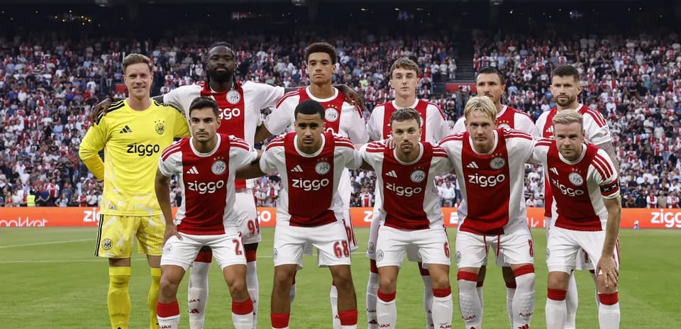Ajax team posing for a group photo before match