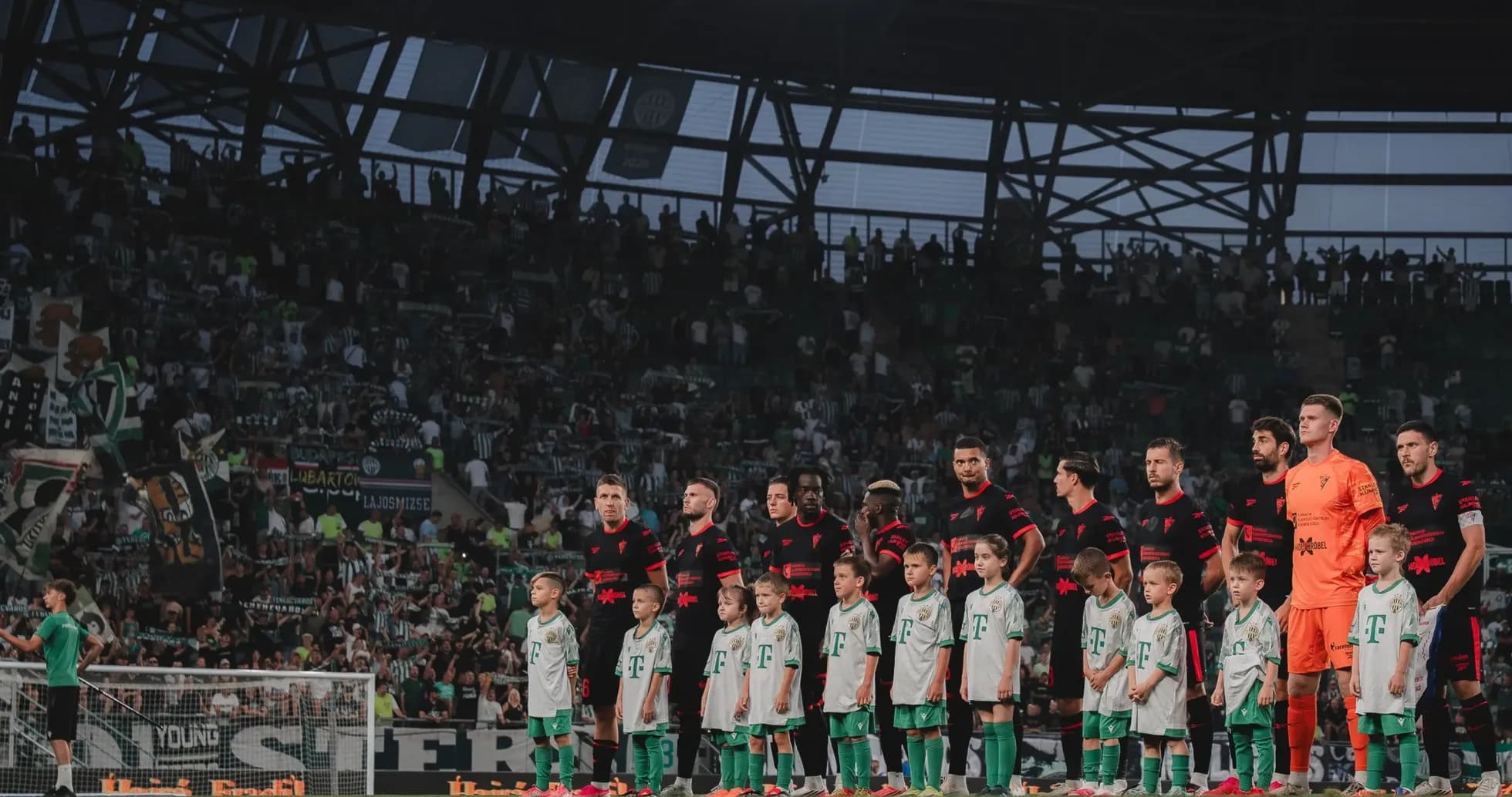 Players and children during UEFA Europa League match
