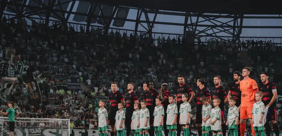 Players and children during UEFA Europa League match