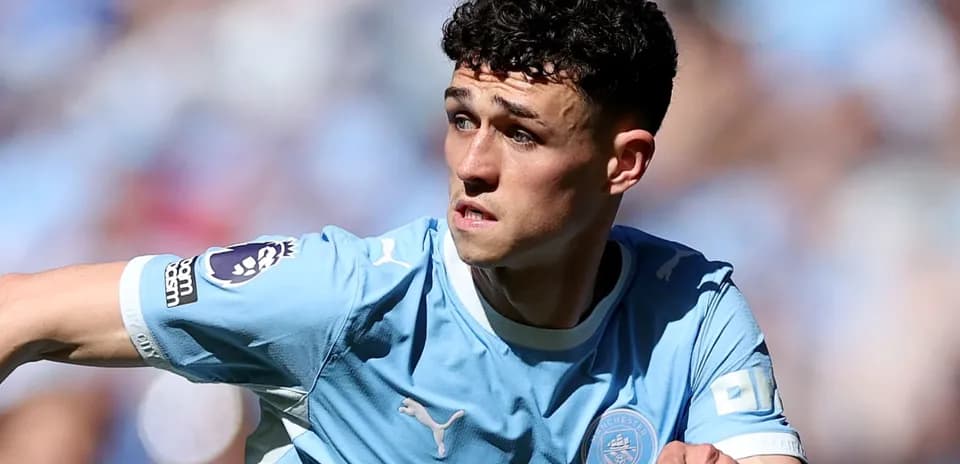 Player in light blue jersey during match action