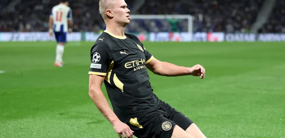 Player kneeling on field during Champions League match