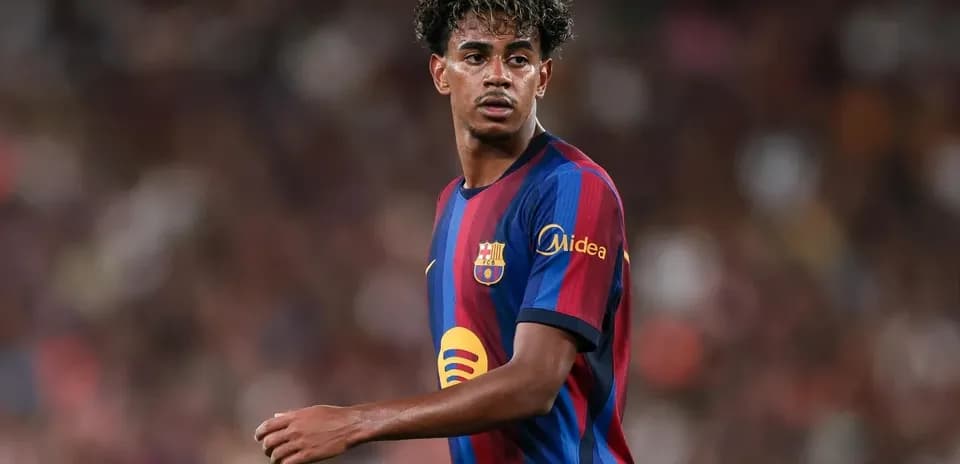 Player wearing FC Barcelona kit on the pitch