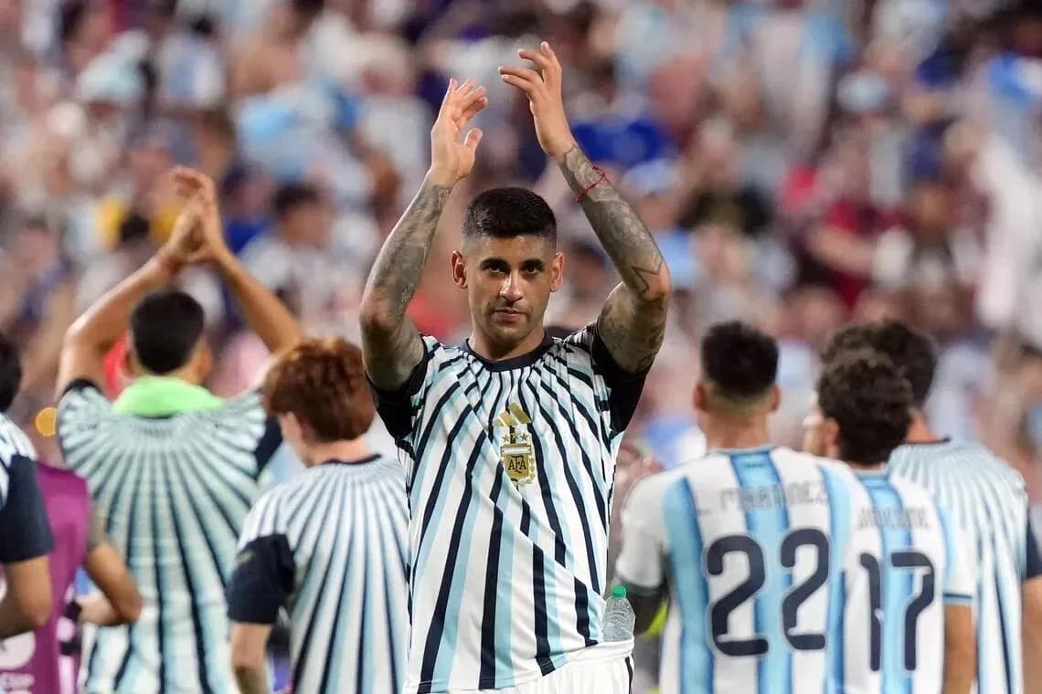 Player applauding fans after the match