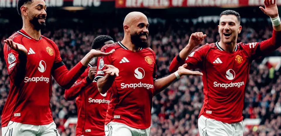 Manchester United players celebrating a goal