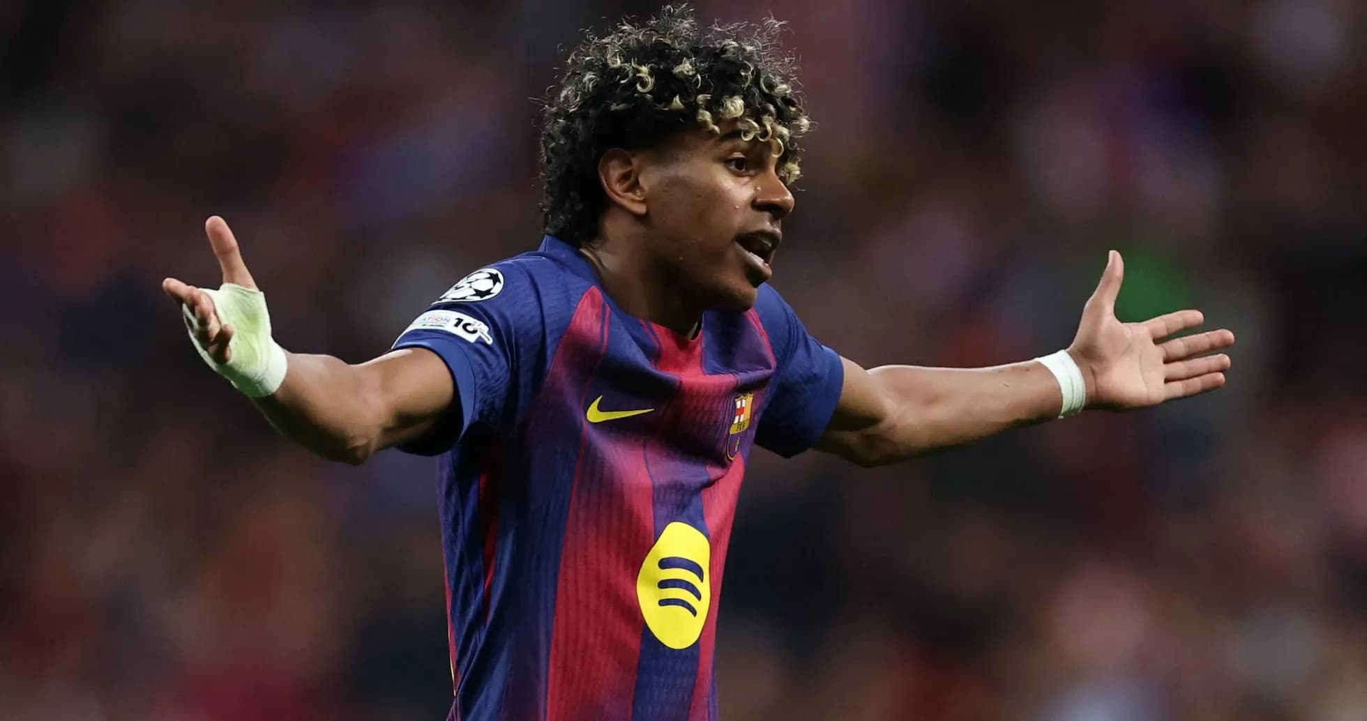 Player gesturing during a UEFA Champions League match