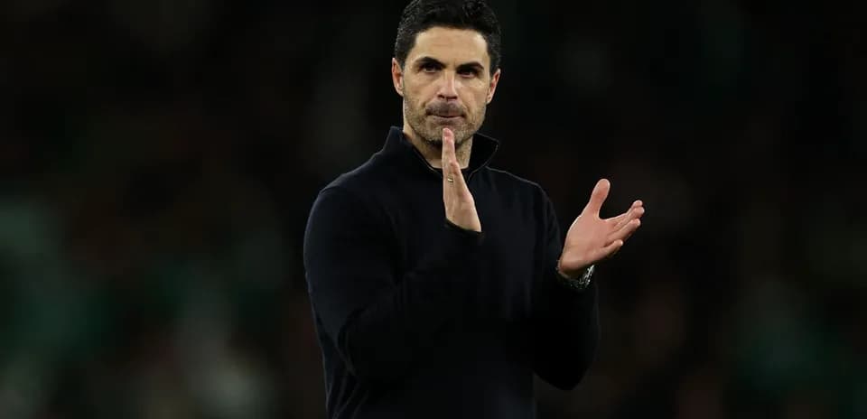 Manager applauding during a match