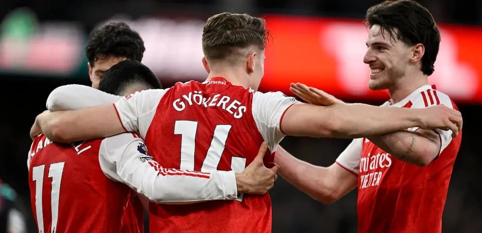 Arsenal players celebrating a goal during match