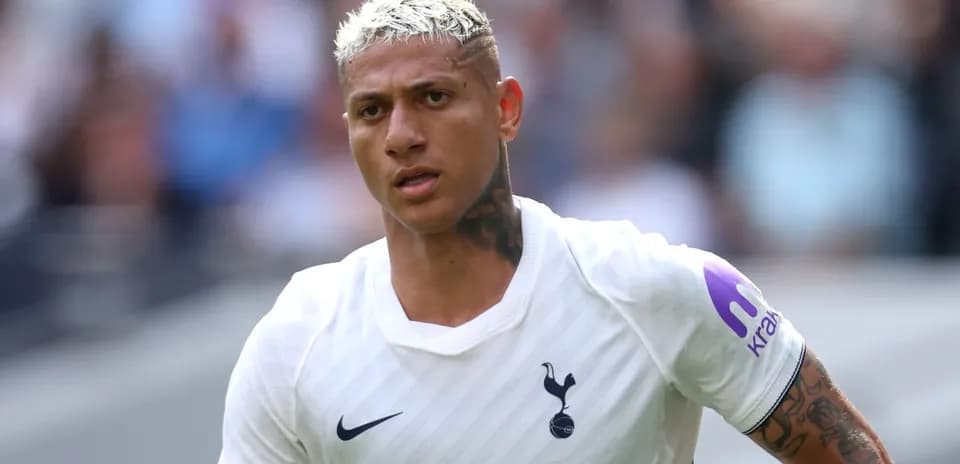 Player in Tottenham jersey during match action