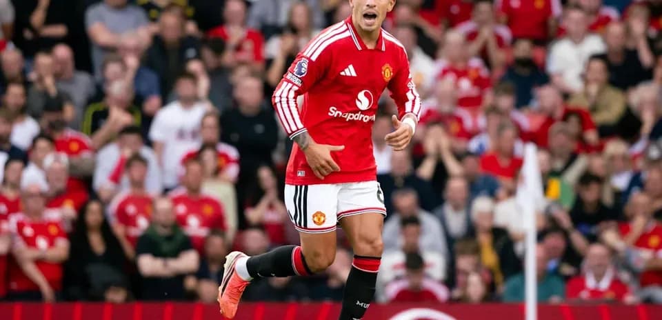 Player celebrating in Manchester United jersey during match