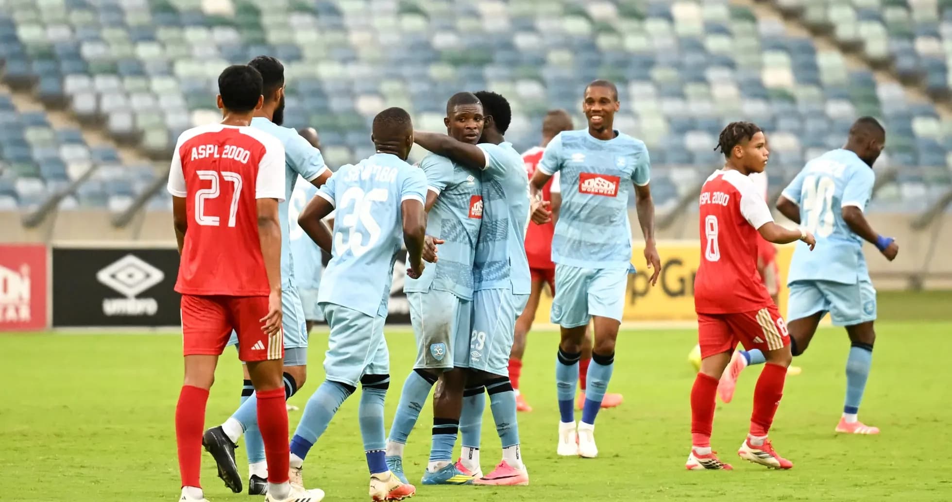 Players celebrating during ASPL 2000 vs Durban City