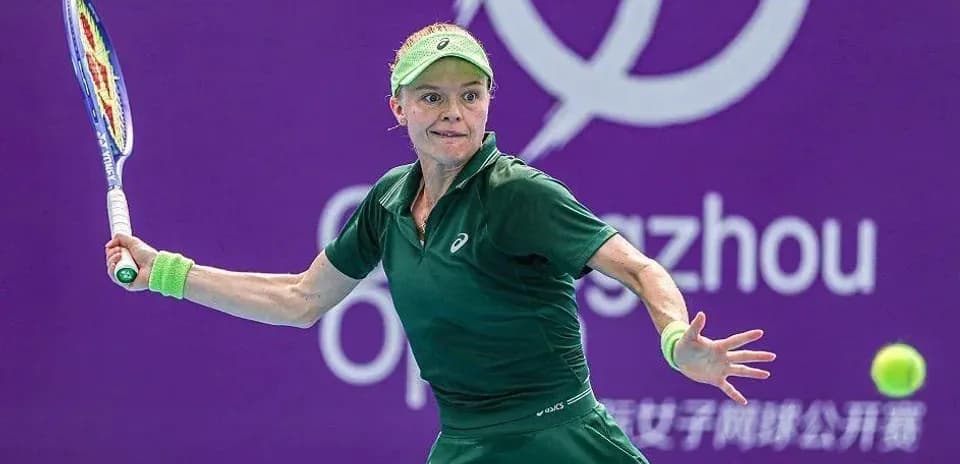 Tennis player hitting a forehand shot on court