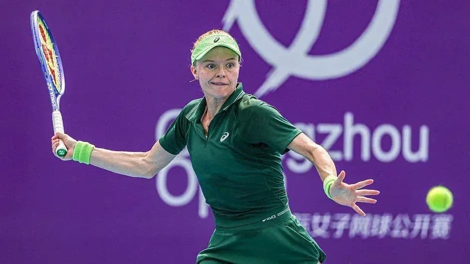 Tennis player hitting a forehand shot on court