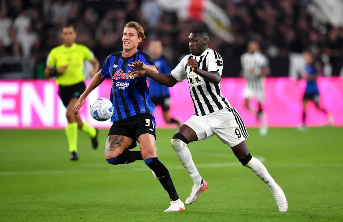Two players battling for the ball during match