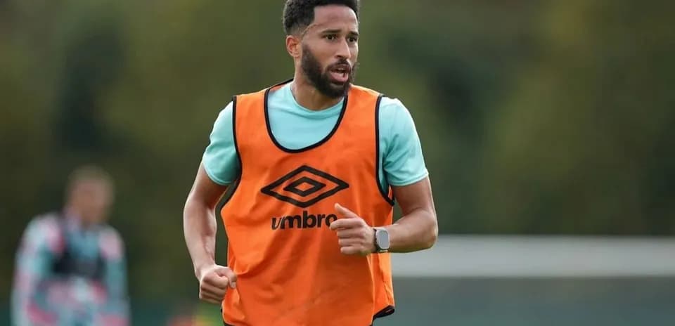 Player wearing training bib running during practice