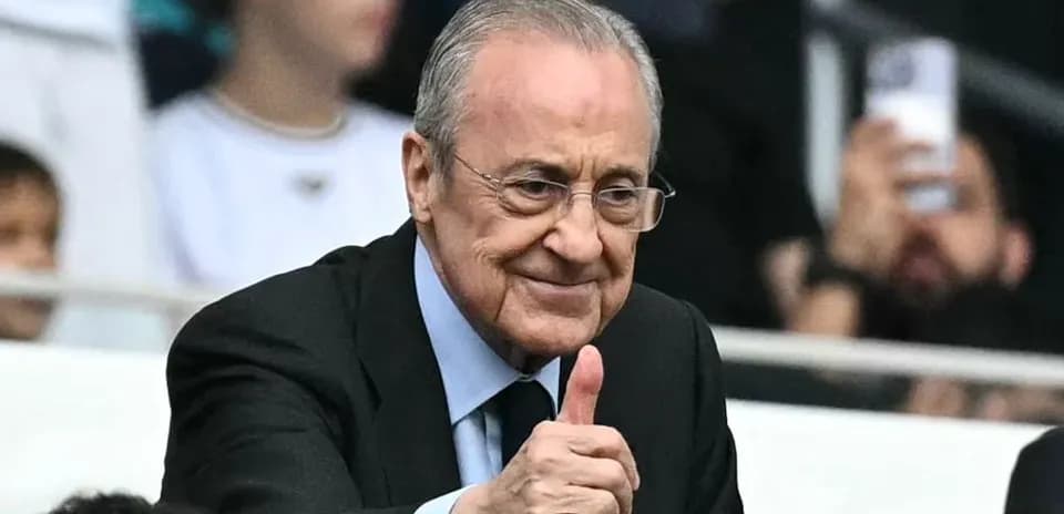 Man giving thumbs up in stadium seats