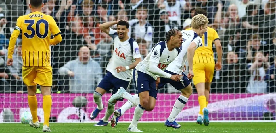 Tottenham players celebrating a goal against Brighton