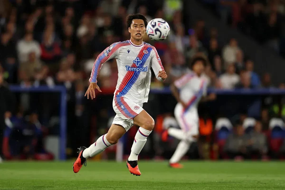 Player sprinting after the ball during match