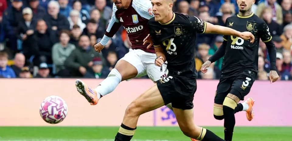 Aston Villa player shooting during Burnley match