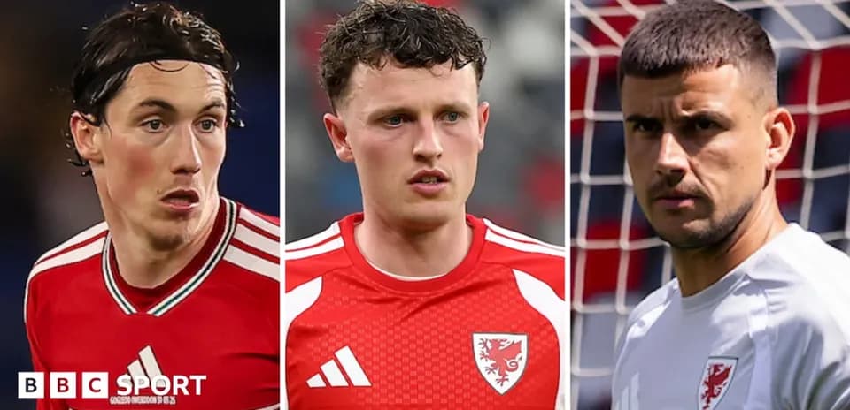 Three Welsh football players posing for a photo