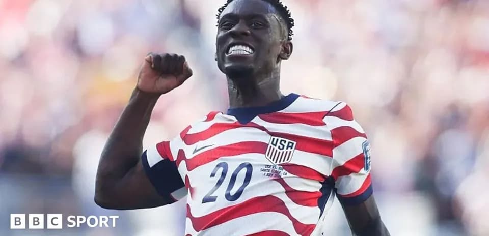 Player celebrating goal in USA team jersey