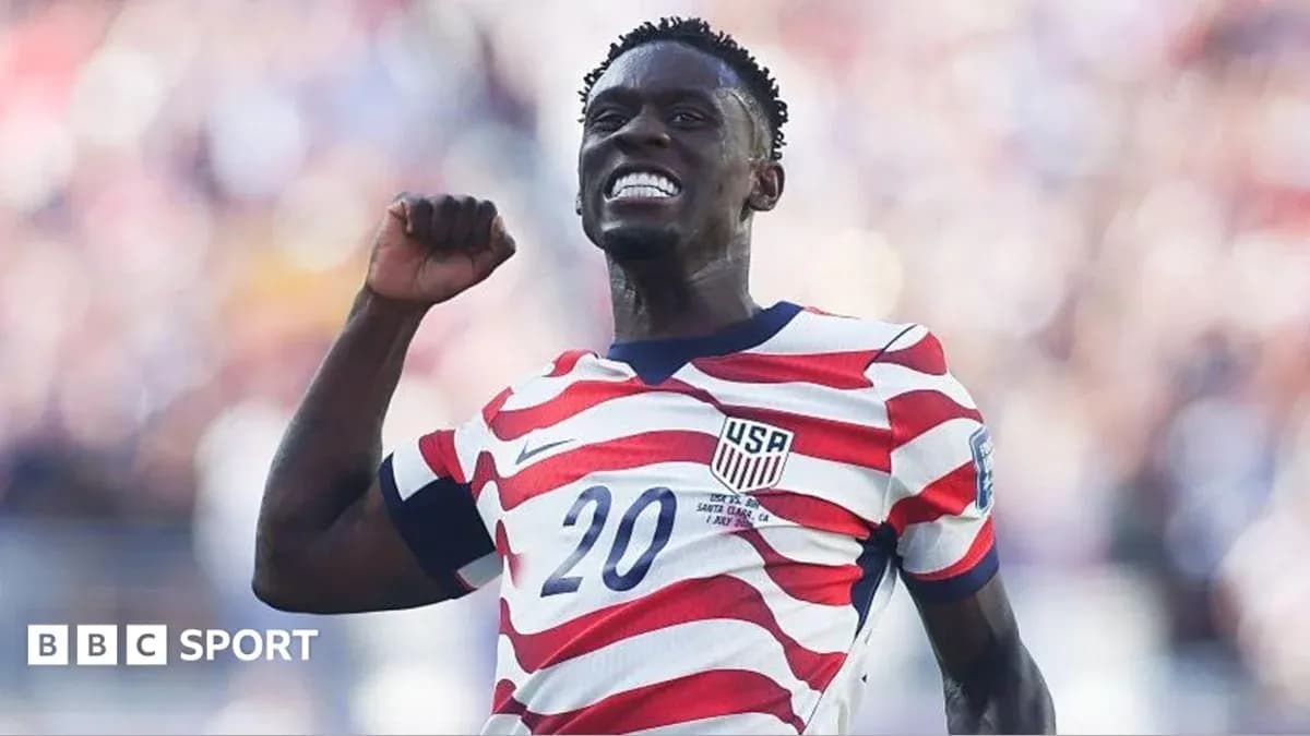 Player celebrating goal in USA team jersey