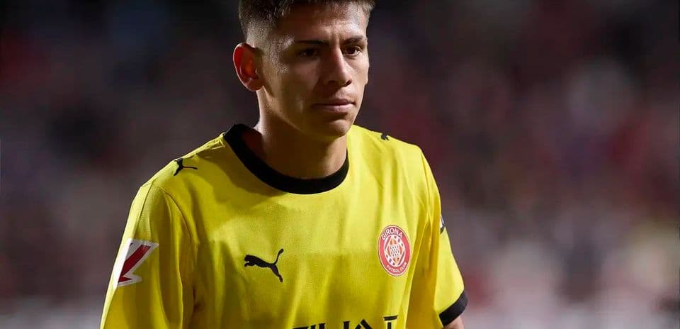 Player wearing yellow goalkeeper jersey during match