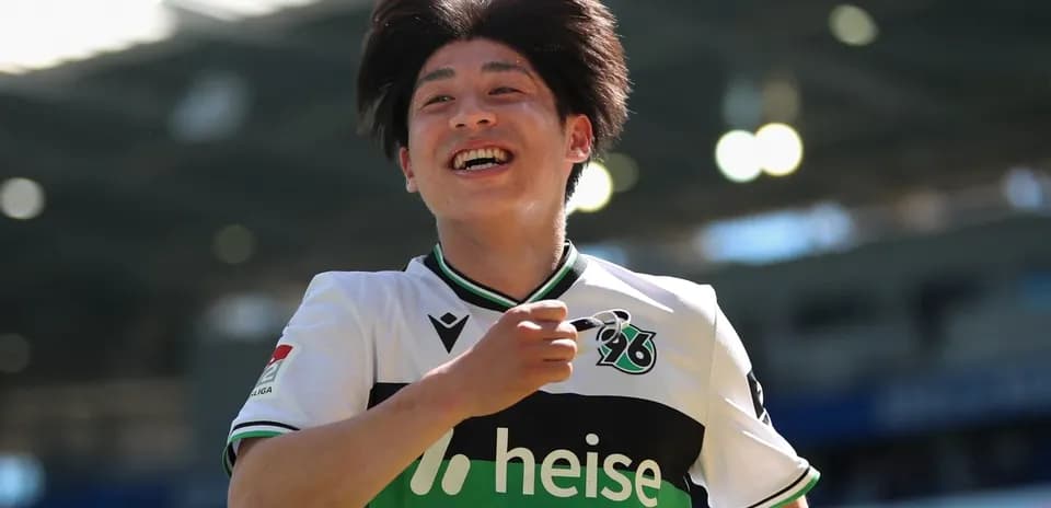 Player celebrating a goal on the pitch