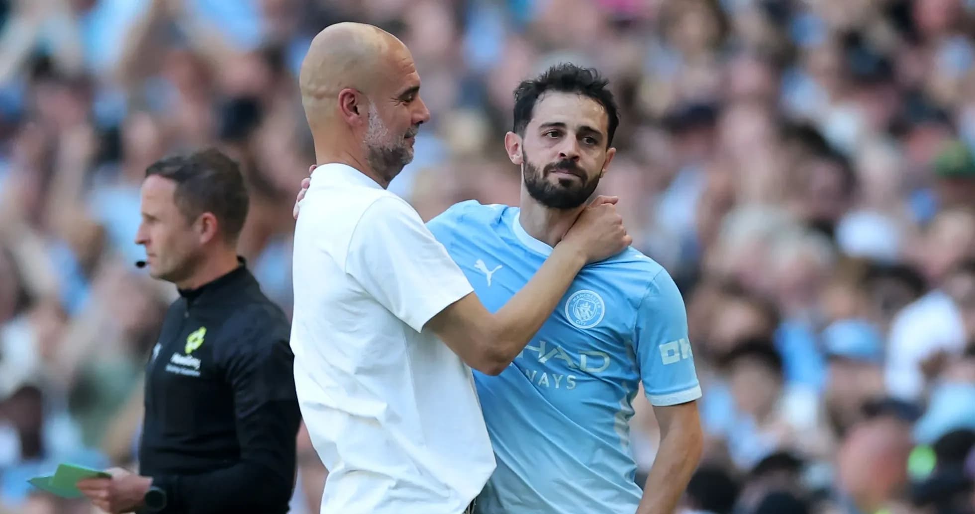 Manager and player discussing on the sidelines