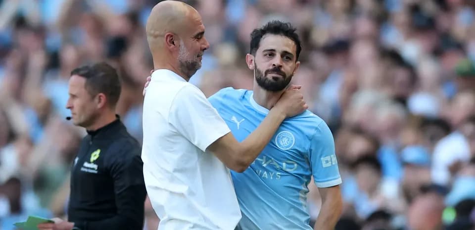 Manager and player discussing on the sidelines