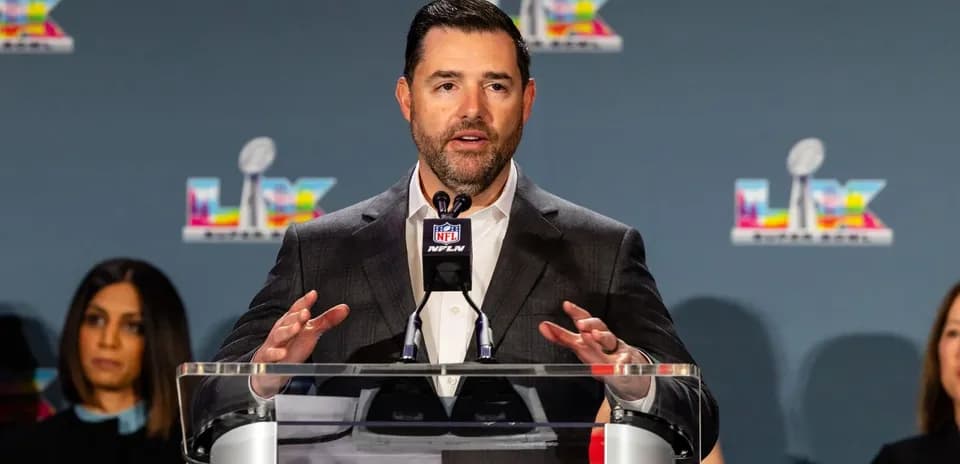 Speaker at NFL press conference discussing upcoming event