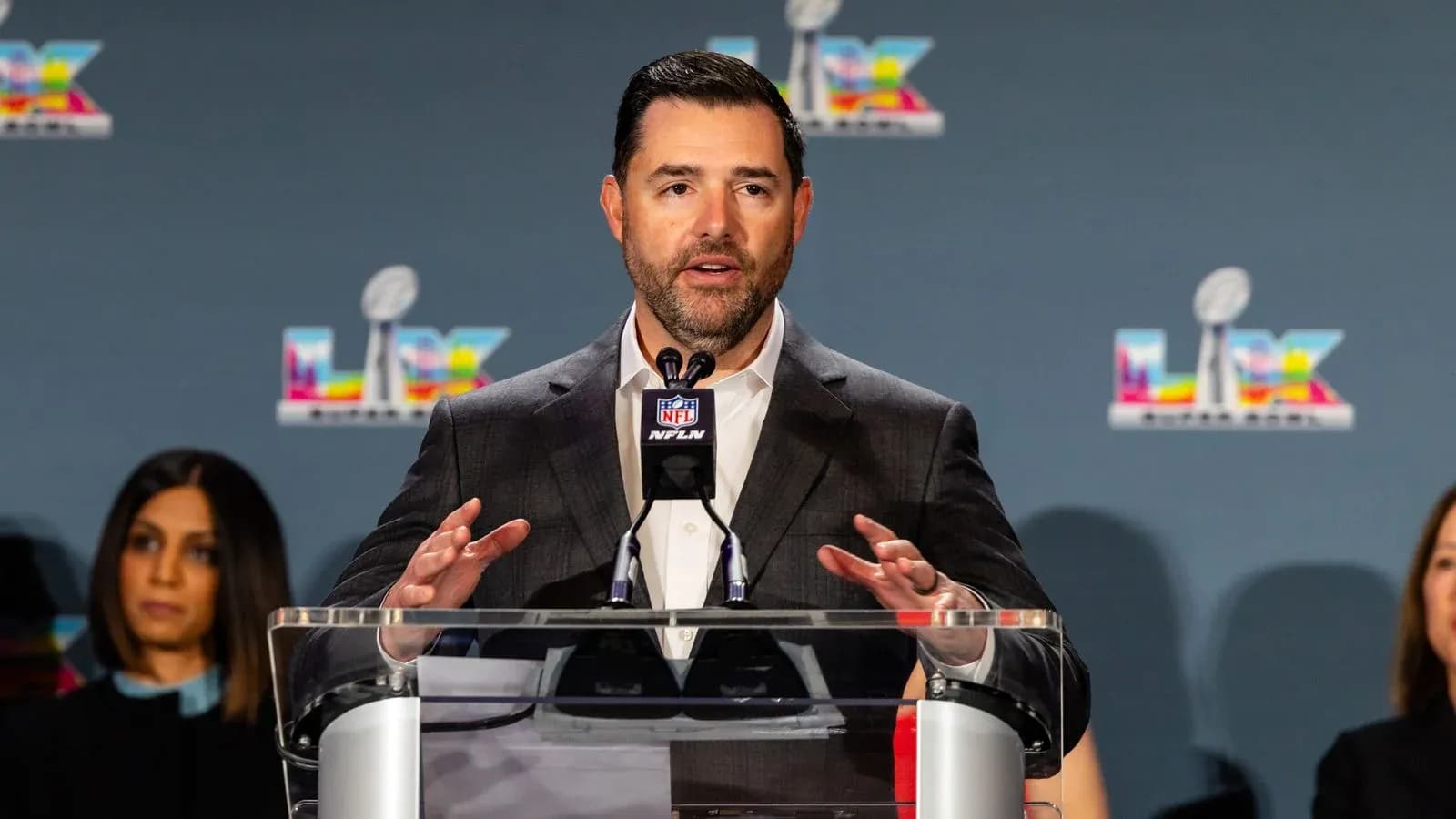 Speaker at NFL press conference discussing upcoming event