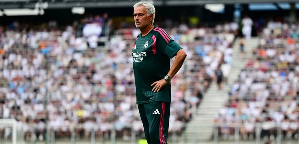 Manager observing match from the sidelines