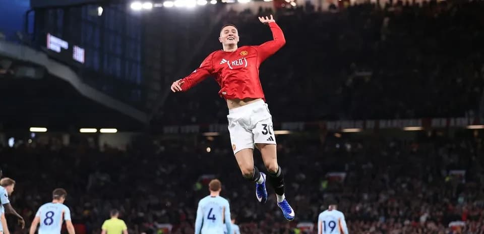 Player celebrating a goal during Manchester match