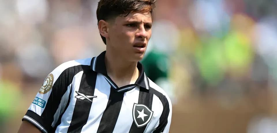 Player wearing black and white striped jersey on field