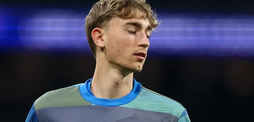 Goalkeeper in Real Madrid kit during match warm-up