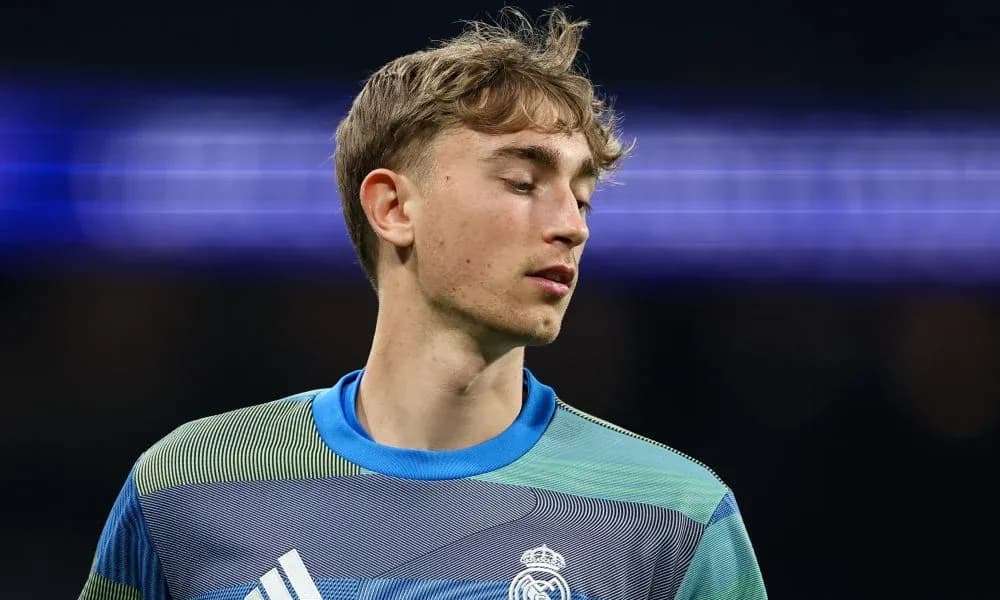 Goalkeeper in Real Madrid kit during match warm-up