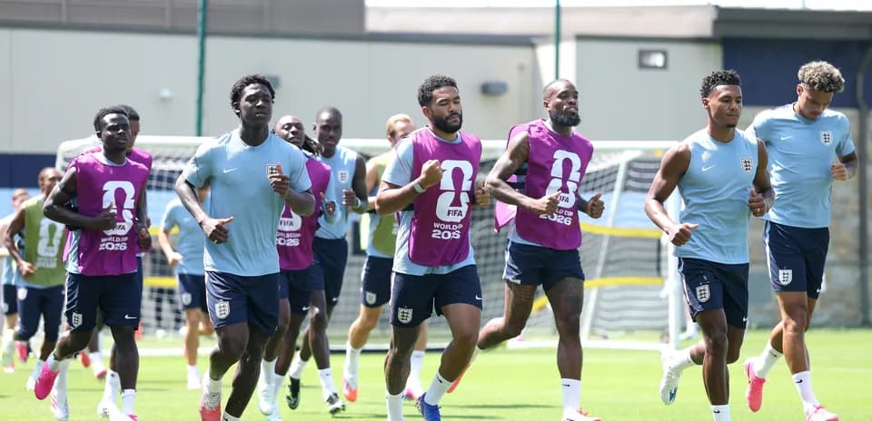 England team members jogging during training session