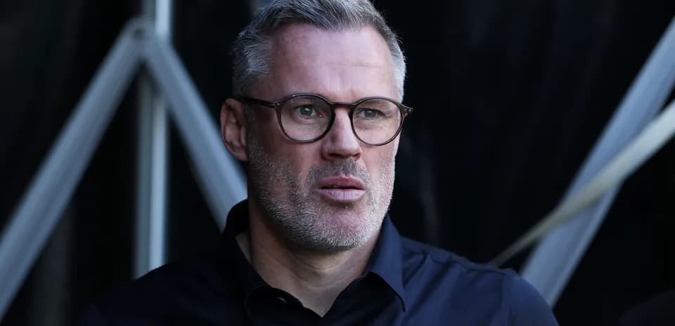 Man with glasses looking intently off-camera