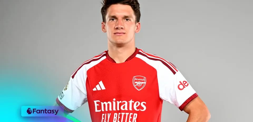 Player in Arsenal jersey posing for portrait