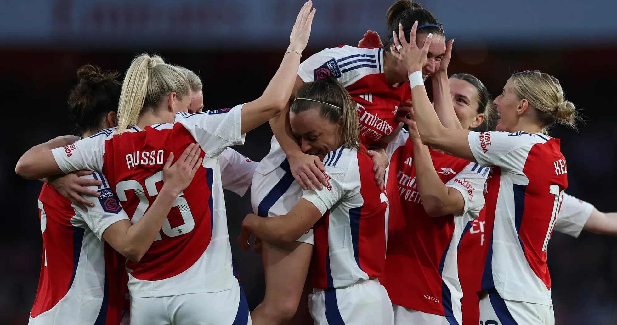 Arsenal W players celebrating a goal