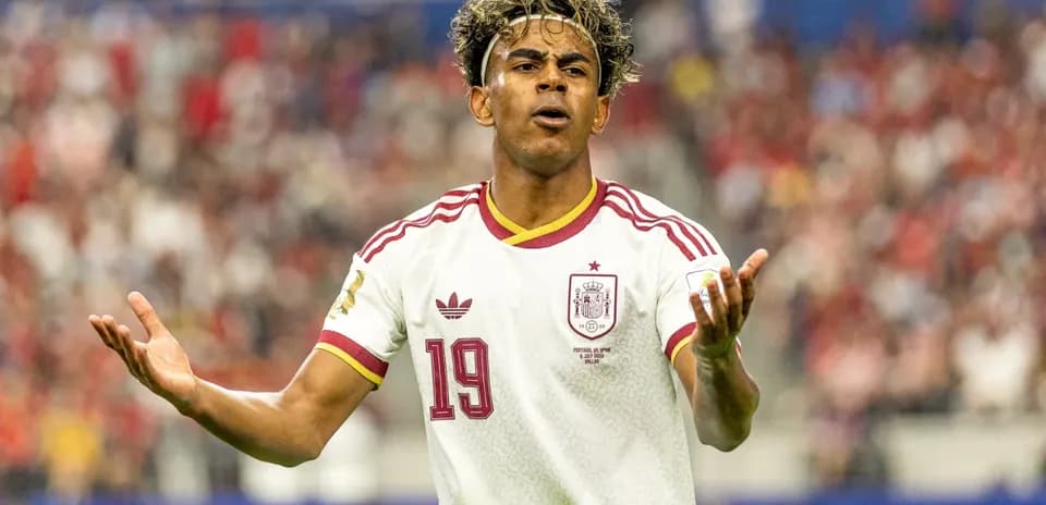 Player gesturing during match in Spain jersey